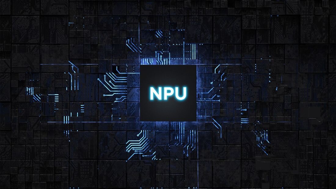 Centralnie umieszczony procesor z podświetlonym na niebiesko napisem NPU (Neural Processing Unit) na tle ciemnej, futurystycznej płyty głównej z widocznymi, świetlnymi ścieżkami elektronicznymi; grafika symbolizuje technologię Intel AI Boost w laptopie ASUS VivoBook S 14 - Intel AI Boost