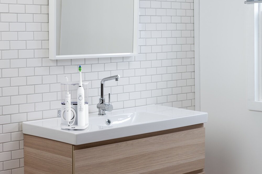 Irygator ze szczoteczką WATERPIK CC-04 3 tryby pracy, miękkie włosie, ładowarka, etui