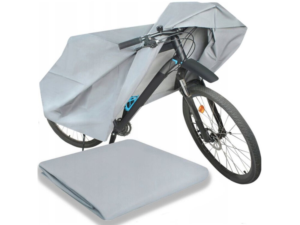 Pokrowiec na rower EXTRALINK 14046 białe tło rower okryty pokrowcem obok leży złożony pokrowiec ochrona uniwersalne zastosowanie
