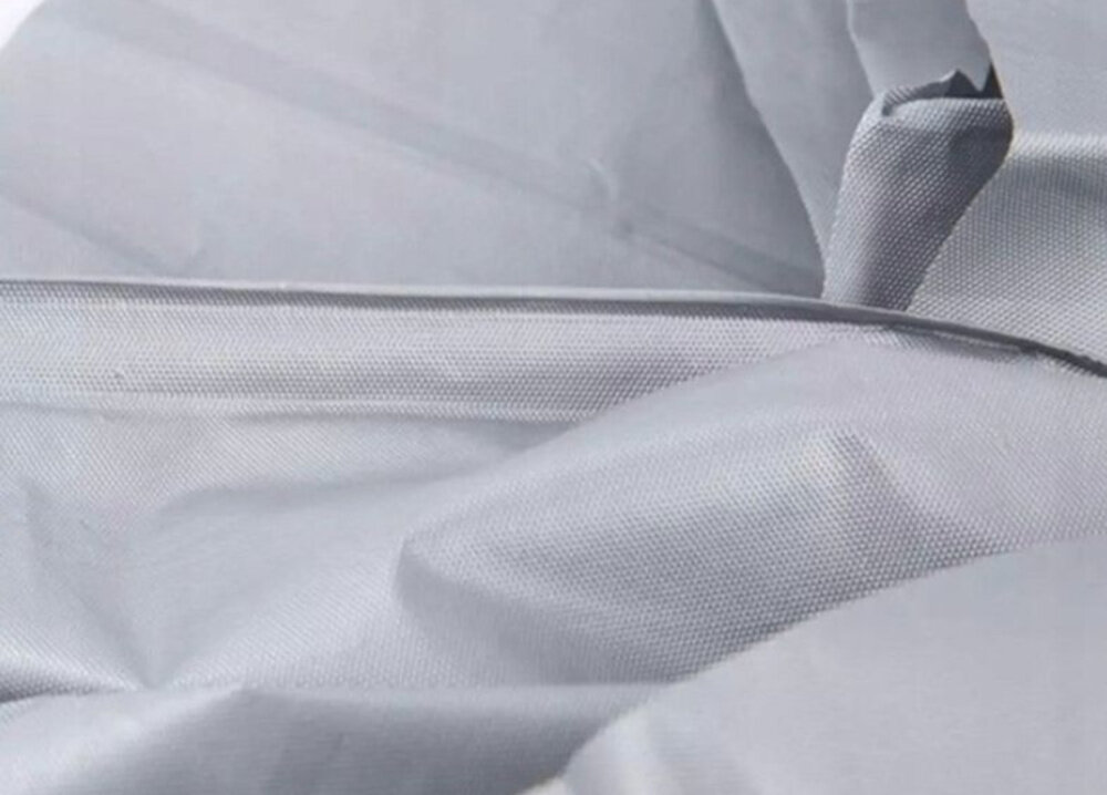 Pokrowiec na rower EXTRALINK 14046 zbliżenie na materiał czyszczenie pokrowca jest proste i nie wymaga specjalistycznych środków wilgotna ściereczka utrzymanie ochrony w dobrym stanie jest szybkie i wygodne pojazd pozostaje czysty i przygotowany do jazdy