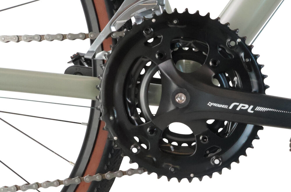 Rower gravel INDIANA Claris M20 28 cali męski Zielony zbliżenie na korbę i support lekka i wydajna konstrukcja korby PROWHEEL typu RPL 3 Speed przenoszenie mocy przez pedał jest bardzo efektywne wkład suportu marki THUN typu Twist-ML 2.0 solidny wytrzyma obciążenie nawet w trudnych warunkach wytrzyma bardzo duży nacisk na pedały