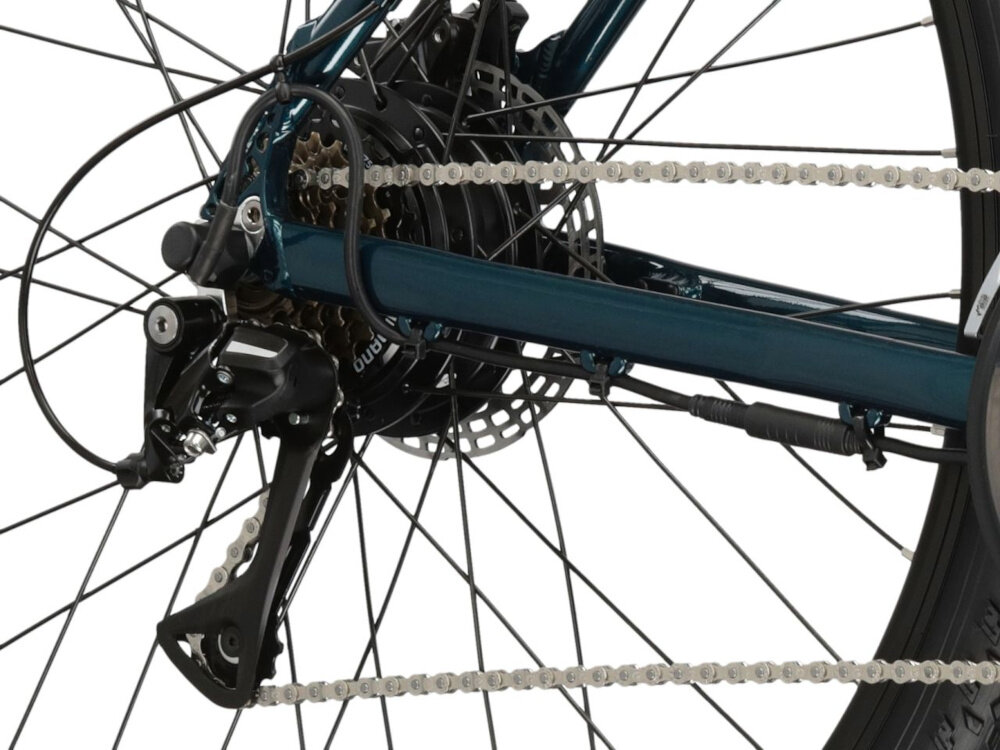 Rower elektryczny KROSS Hexagon Boost 345 M19 29 cali Turkusowo-biały zbliżenie na przerzutkę manetki MicroShift typu Mezzo 21 biegów przednia przerzutka SHIMANO Tourney tylna SHIMANO Acera duża wytrzymałość sprawne działanie zmiana biegów jest płynna i bezproblemowa przerzutki SHIMANO do rekreacyjnej jazdy