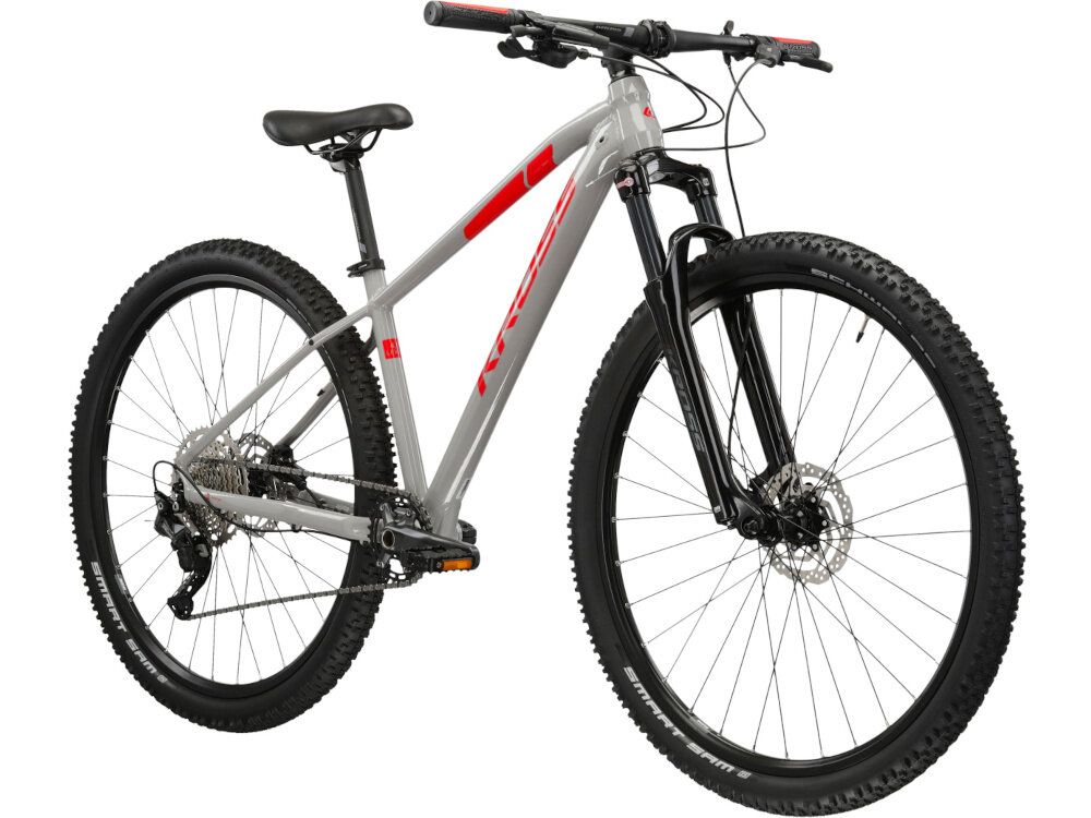 Rower górski MTB KROSS Level 4.0 M17 29 cali męski Szaro-czerwony rower na białym tle widoczny od przodu pod skosem środek codziennego transportu relaks pasja uniwersalność