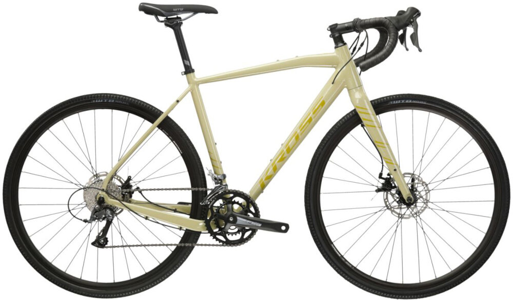 Rower gravel KROSS Esker 1.0 M22 28 cali męski Beżowo-złoty rower widoczny z boku zdjęcie na białym tle komfort jazdy odpowiednia kontrola nad rowerem 22-calowa aluminiowa rama rower lekki zwinny łatwo go podnieść odporność na korozję wybór rozmiaru ramy Twój wzrost mierzony w zrelaksowanej pozycji typ roweru dla osób o wzroście od 184 do 194 cm