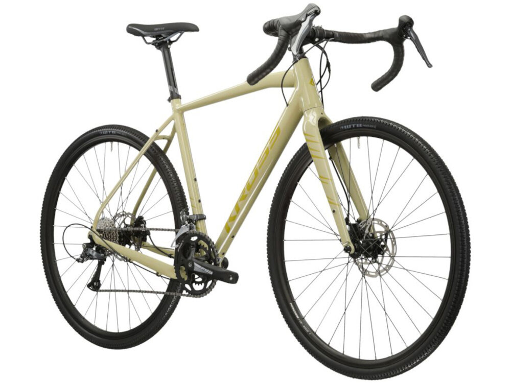 Rower gravel KROSS Esker 1.0 M19 28 cali męski Beżowo-złoty rower widoczny od przodu pod skosem pasja hobby aktywność jazd rowerem
