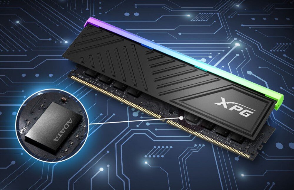 Komputer MAD DOG DIAXID605-A10WR32WP Moduł pamięci RAM z podświetleniem RGB, ukazany w futurystycznej stylistyce z efektem świetlnym w tle, pamięć, taktowanie, opóźnienia, radiatory