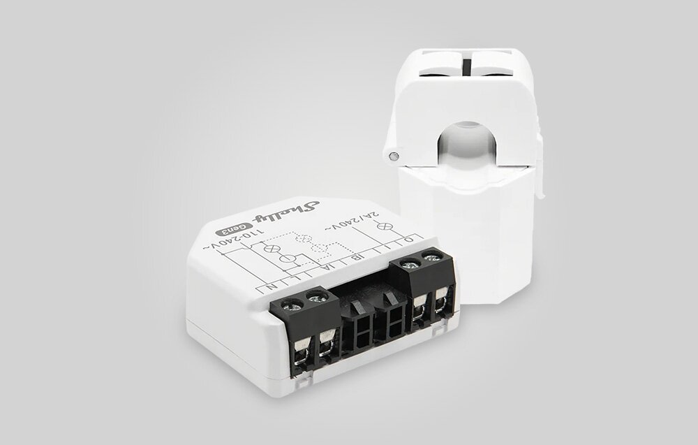 Sterownik SHELLY EM Gen3 Wi-fi Bluetooth, parametry, napięcie, zakres, prąd, na szarym tle sterownik leży poziomo