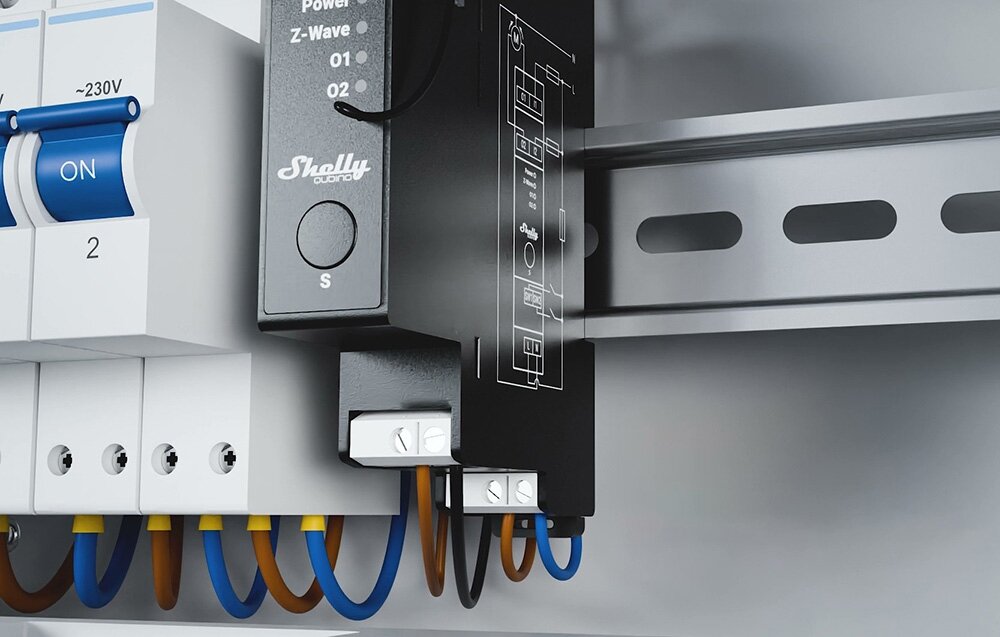 Przekaźnik SHELLY Wave Pro Shutter, rolety, żaluzje, zasilanie, elektryka, zbliżenie na przekaźnik zamontowany na szynie DIN