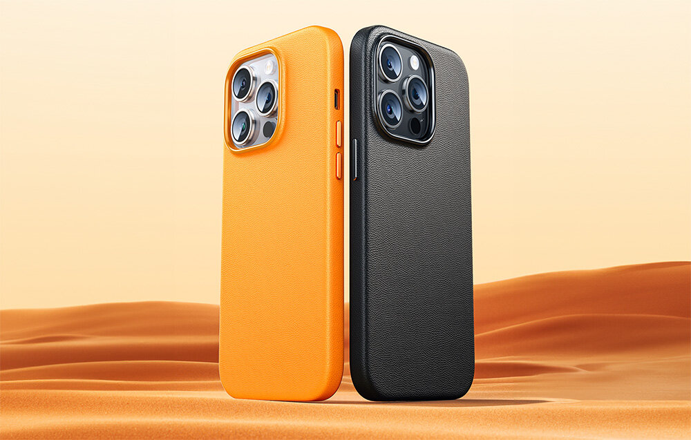 Na obrazie widoczne są dwa etui na telefon w kolorach pomarańczowym i czarnym, stojące na tle przypominającym pustynię. Etui mają wycięcia na aparat z trzema obiektywami.