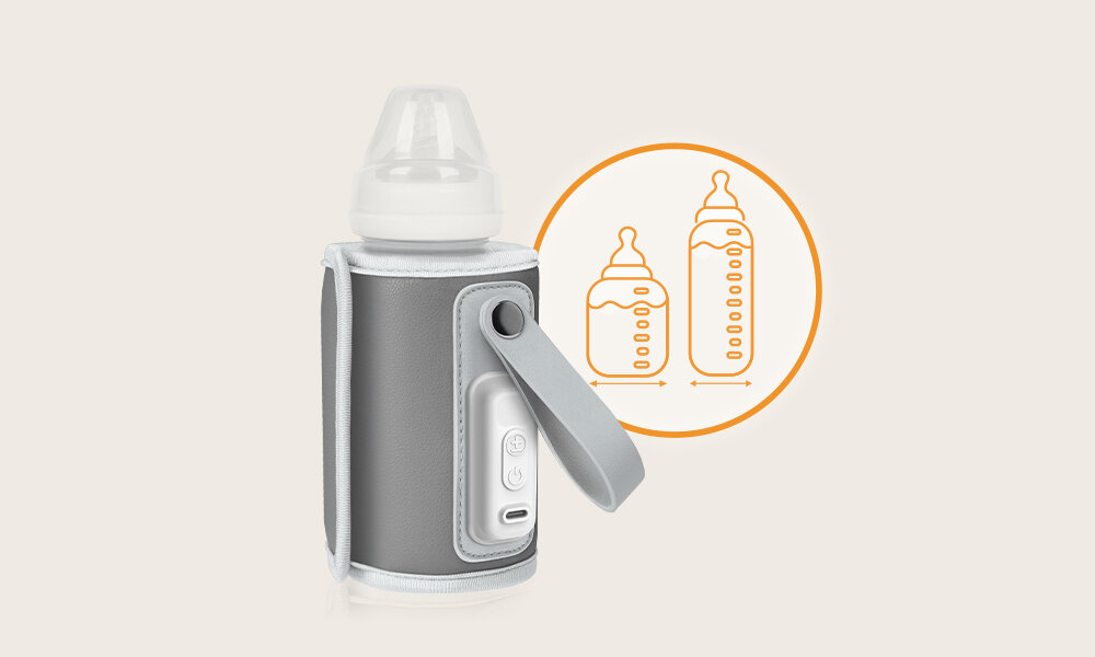 Podgrzewacz do butelek w kolorze srebrnym z rysunkiem dwóch butelek w pomarańczowym okręgu. Na podgrzewaczu widoczny jest przycisk z symbolem plusa i minusa oraz port USB.