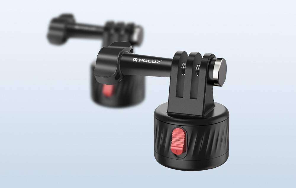 Na obrazie widoczny jest czarny adapter magnetyczny z logo \'Puluz\', posiadający czerwony element regulacyjny. W tle znajduje się drugi, rozmyty adapter o podobnym wyglądzie.