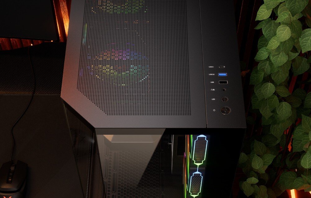 Obudowa KRUX Empero Widok z góry na panel górny obudowy z perforacją oraz portami: USB typu C, USB 3.0, dwa USB typu A, gniazdo jack, przycisk LED i włącznik, porty, złącza