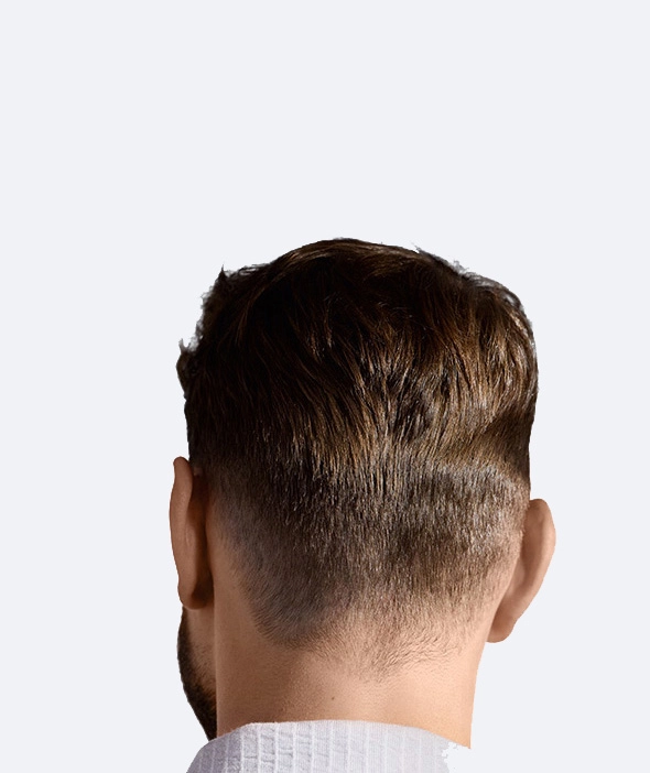 Glowa mezczyzny z efektem po strzyżeniu.