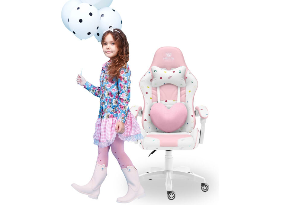 Dziewczynka trzyma balony w kropki, obok niej znajduje się różowo-biały fotel gamingowy z poduszką w kształcie serca i napisem \'HELL\'S CHAIR Rainbow Kids 2.0\'.