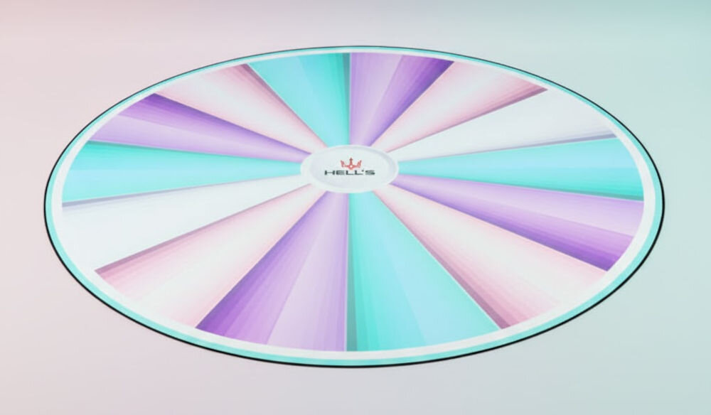 Mata pod fotel HELL'S CHAIR Rainbow Wielokolorowy prezentacja maty na tle z różowo-niebieskim gradientem funkcjonalny dodatek na lata praktyczny element wyposażenia pomaga utrzymać porządek indywidualny styl