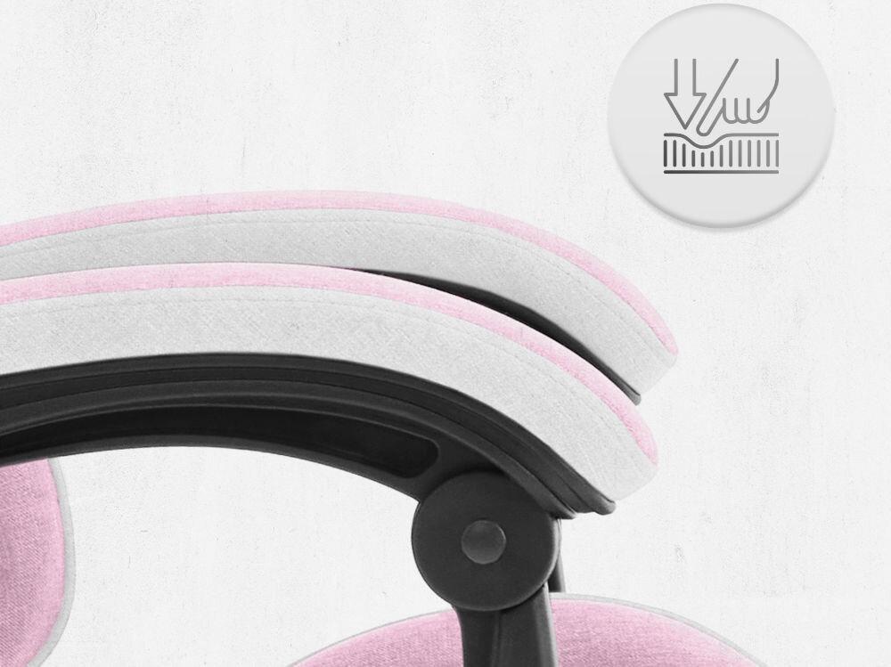 Fotel CABRO C500 Różowo-Biały Zbliżenie na miękki podłokietnik fotela z ikoną nacisku, podkreślającą komfort użytkowania i jakość wypełnienia fotel gamingowy z podłokietnikami z miękkimi padami