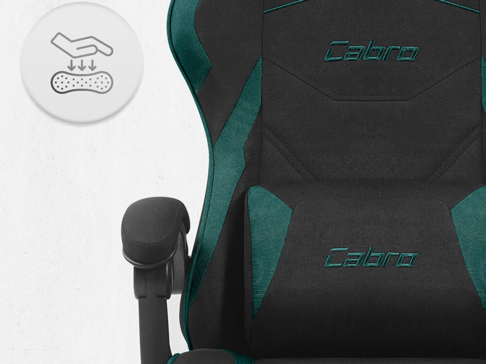 Fotel CABRO C502 Czarno-Zielony Zbliżenie na oparcie i podłokietnik fotela z ikoną dłoni naciskającej miękką piankę wypełniającą fotel gamingowy z oddychającą tapicerką z tkaniny