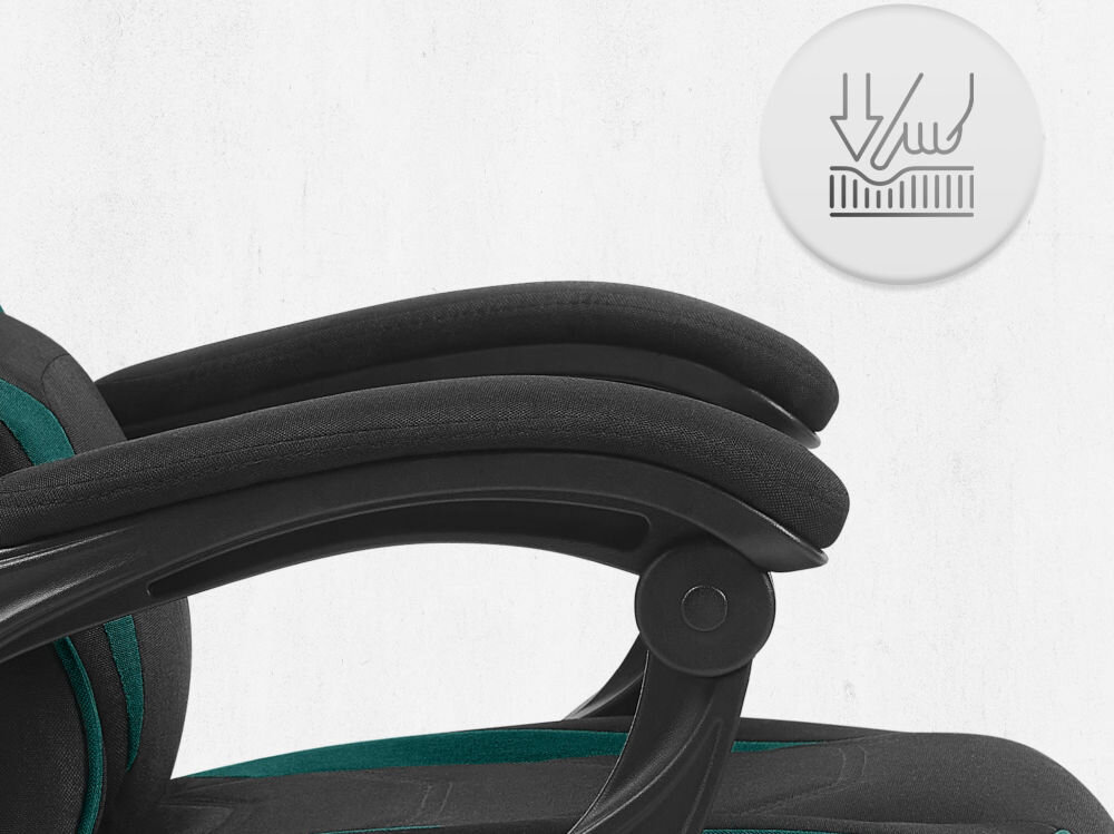 Fotel CABRO C502 Czarno-Zielony Zbliżenie na miękki podłokietnik fotela z ikoną nacisku, podkreślającą komfort użytkowania i jakość wypełnienia fotel gamingowy z podłokietnikami z miękkimi padami