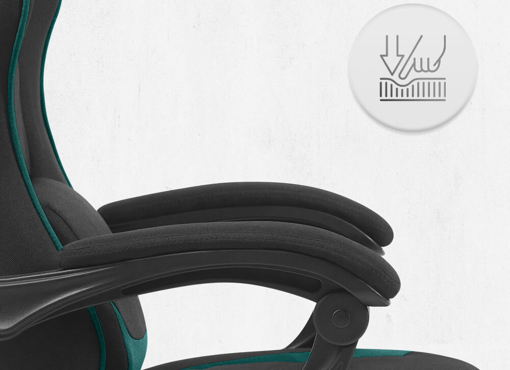 Fotel gamingowy CABRO C504 Czarny-zielony  Zbliżenie na miękki podłokietnik fotela z ikoną nacisku, podkreślającą komfort użytkowania i jakość wypełnienia fotel gamingowy z podłokietnikami z miękkimi padami