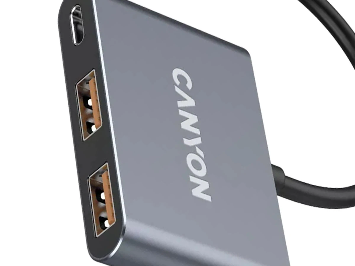 Szary hub USB-C z dwoma portami USB i widocznym logo \'CANYON\'.