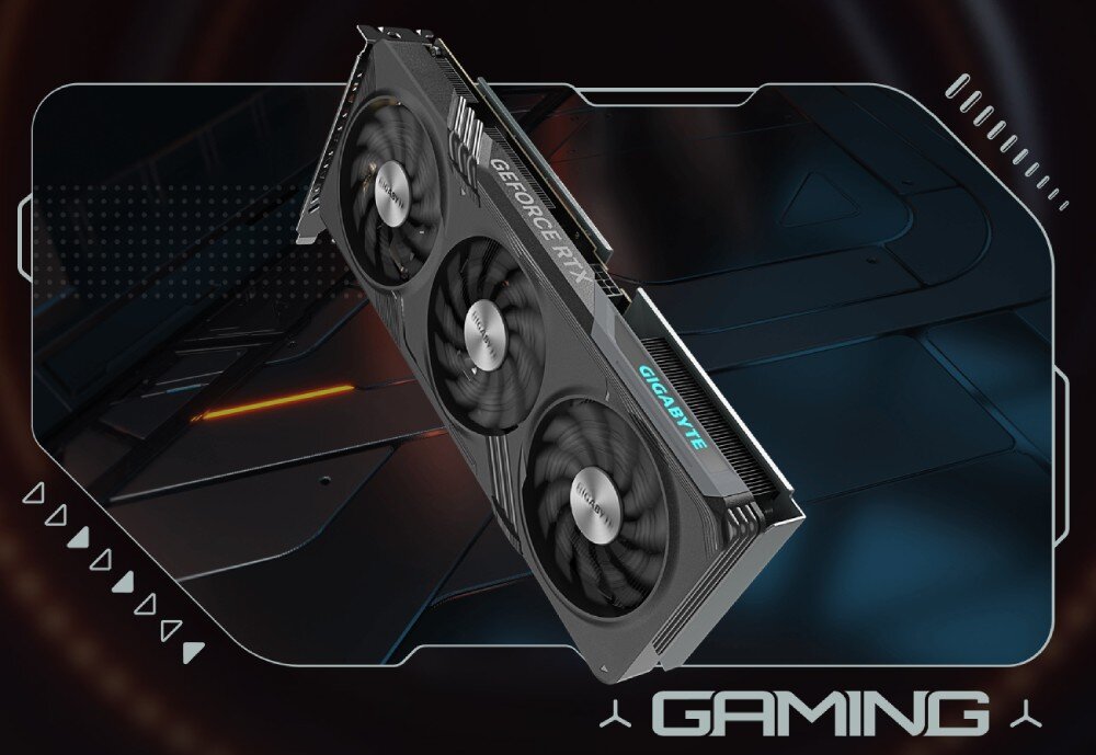 Komputer MAD DOG ENDORFY500AIR-A23DB32 Karta graficzna z trzema wentylatorami chłodzącymi, oznaczona logotypami 'Gigabyte' i 'GeForce RTX', przedstawiona na tle futurystycznej, metalicznej powierzchni z elementami graficznymi, karta graficzna, parametry, wentylatory