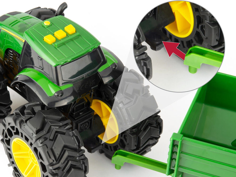 Traktor TOMY Monster Treads John Deere z przyczepą 47353 zbliżenie na łączenie z przyczepą podnoszona klapa odłączana przyczepa duże koła elastyczne koła