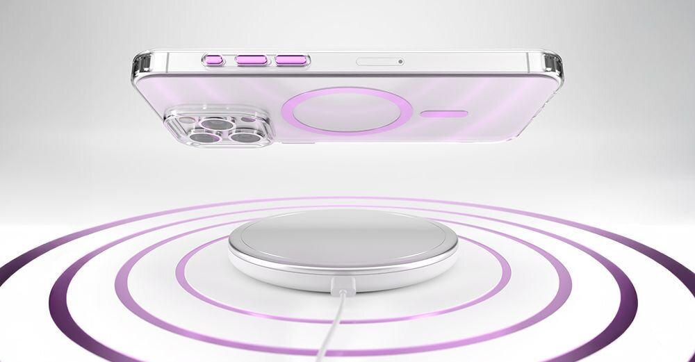 Na obrazie widoczny jest telefon w przezroczysto-różowym etui unoszący się nad okrągłą ładowarką bezprzewodową. W tle widoczne są koncentryczne okręgi w odcieniach różu.
