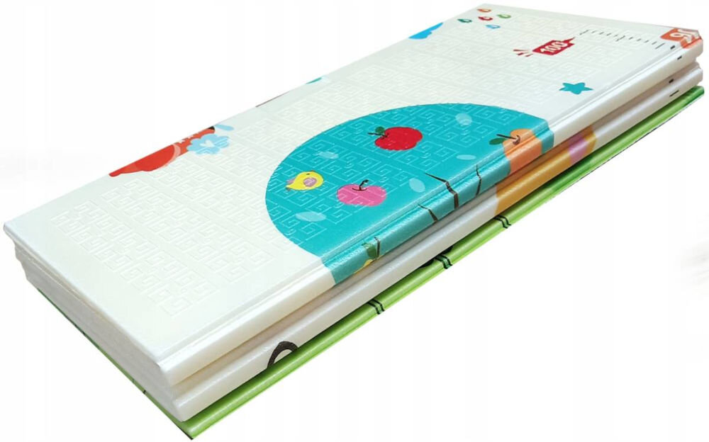 Mata piankowa EXTRALINK 4329 Zbliżenie na krawędź złożonej maty piankowej XPE. Widoczna warstwowa struktura, grubość maty oraz wodoodporna powierzchnia z nadrukiem kolorowych owoców.