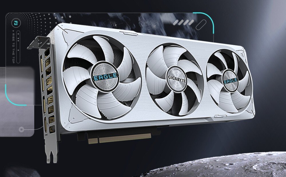 Komputer MAD DOG Powered by Gigabyte AORUS301WH-A02DR32 Biała karta graficzna z trzema dużymi wentylatorami. Na środkowym i prawym wentylatorze widnieje napis 'Eagle', a na lewym 'Gigabyte'. W tle ciemna, graficzna kompozycja, karta graficzna, pamięć VRAM, rdzenie CUDA, technologie
