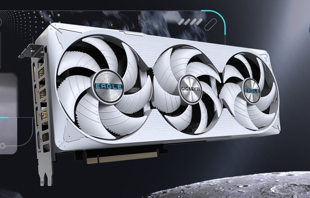 Komputer MAD DOG Powered by Gigabyte AORUS301WH-A03DR32 Biała karta graficzna z trzema dużymi wentylatorami. Na środkowym i prawym wentylatorze widnieje napis 'Eagle', a na lewym 'Gigabyte'. W tle ciemna, graficzna kompozycja, karta graficzna, pamięć VRAM, rdzenie CUDA, technologie