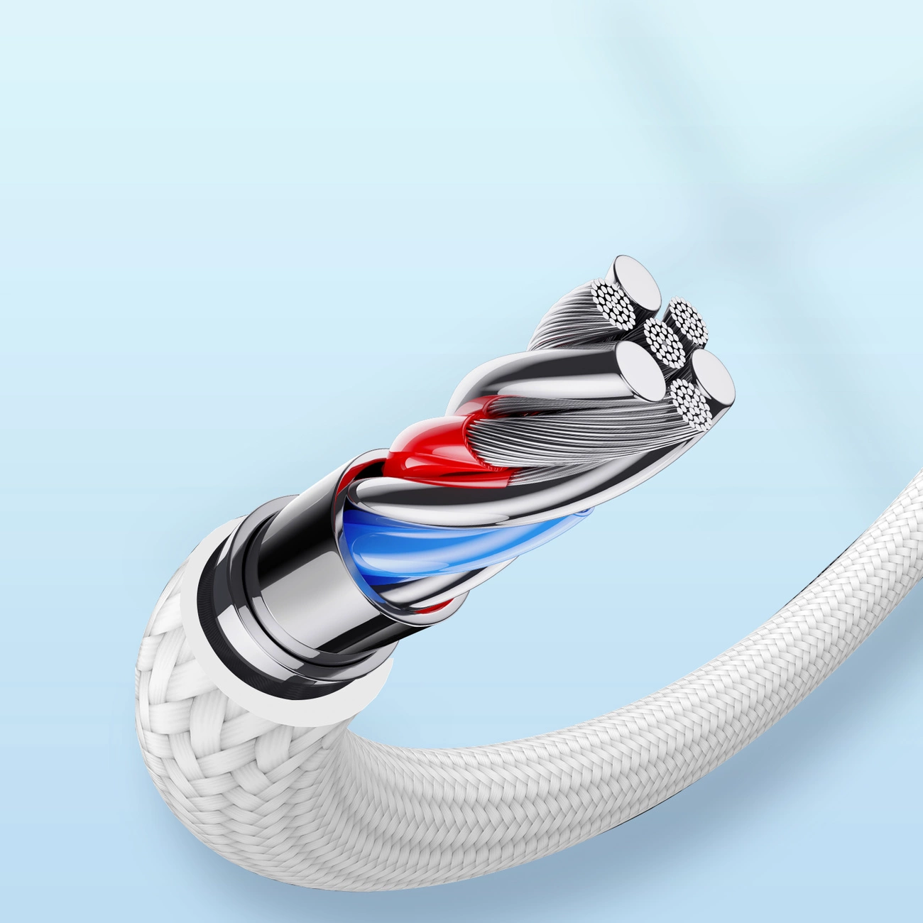 Obraz przedstawia zbliżenie na przekrój kabla z widocznymi kolorowymi przewodami w oplocie. Kabel ma biały, pleciony zewnętrzny materiał ochronny.