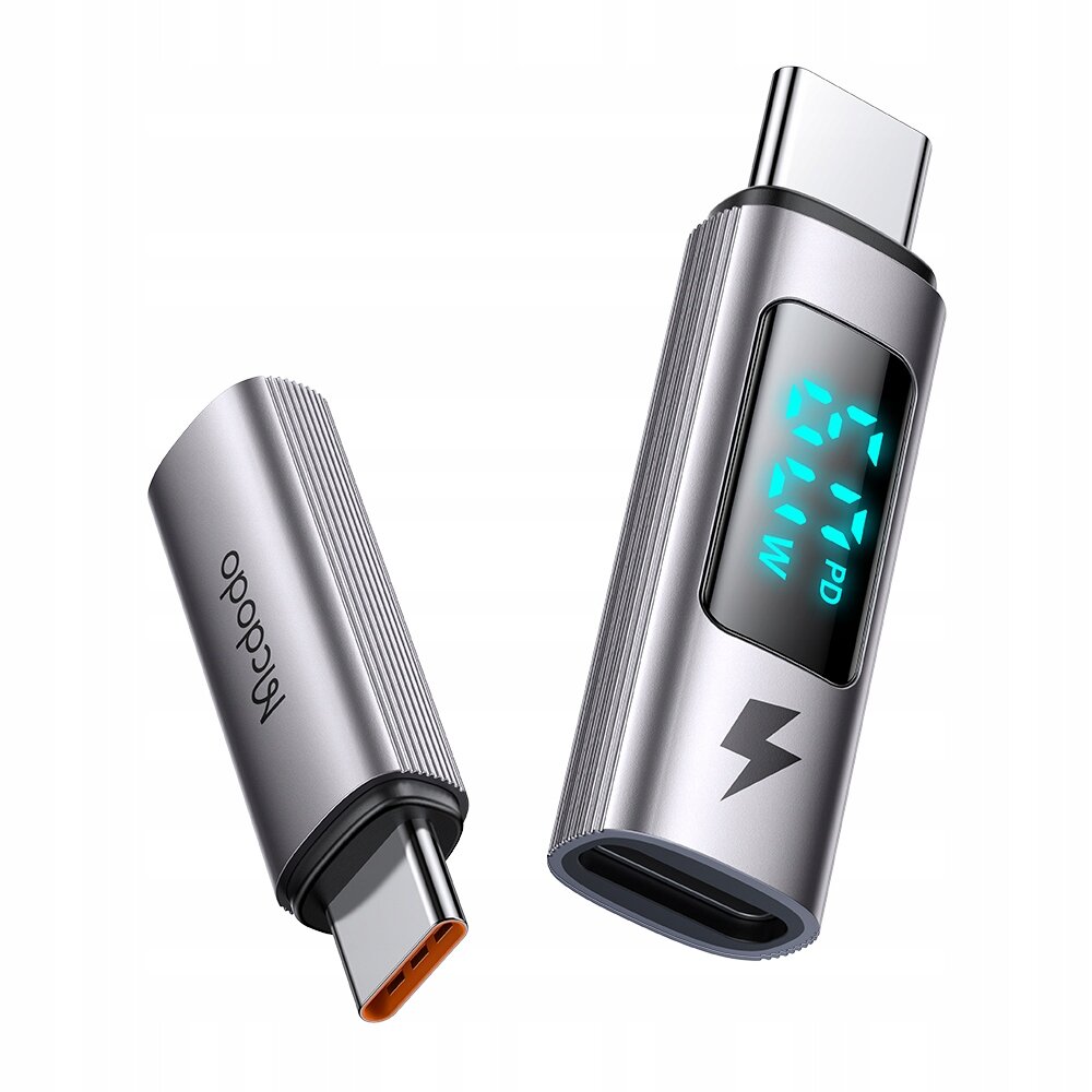 Na obrazie widoczne są dwa metaliczne adaptery USB-C, jeden z wyświetlaczem pokazującym \'21V PD 2.1A 44W\'. Na jednym z adapterów znajduje się logo \'mcdodo\' oraz symbol błyskawicy.