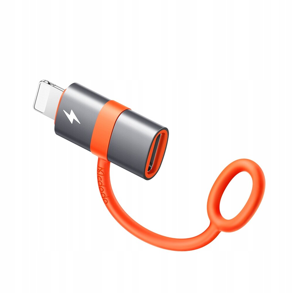 Na obrazie znajduje się adapter USB-C do Lightning w kolorze szaro-pomarańczowym z symbolem błyskawicy. Adapter ma elastyczny pomarańczowy uchwyt z pętlą.