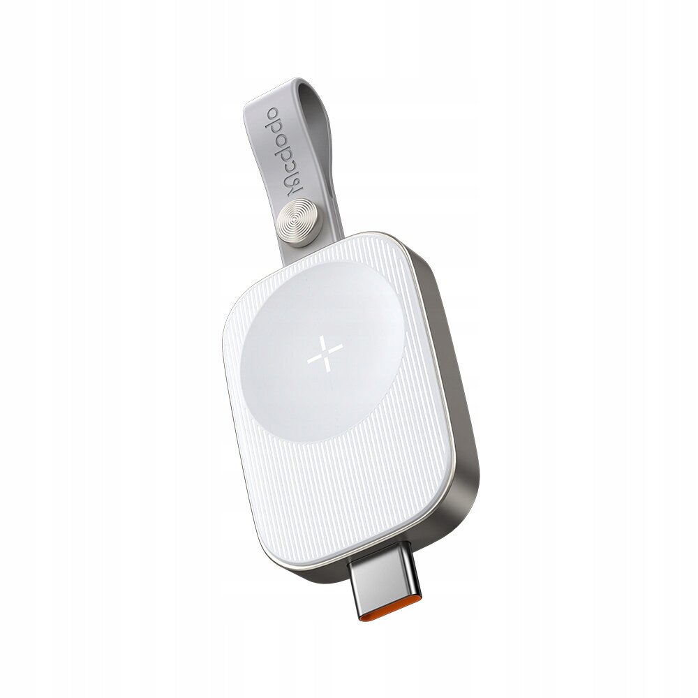 Na obrazie widoczna jest ładowarka indukcyjna z portem USB-C, z okrągłym miejscem do ładowania oznaczonym symbolem \'+\'. Na pasku ładowarki znajduje się napis \'Mcdodo\'.