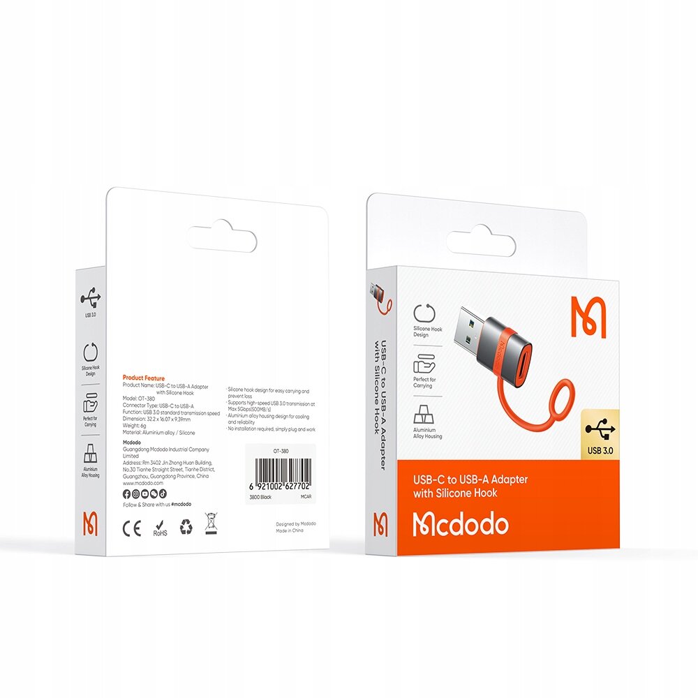 Opakowanie produktu Mcdodo Adapter Przejściówka USB-A 3.0 Do USB-C z silikonowym uchwytem. Widoczne są ikony przedstawiające cechy produktu oraz tekst \'USB-C to USB-A Adapter with Silicone Hook\'.