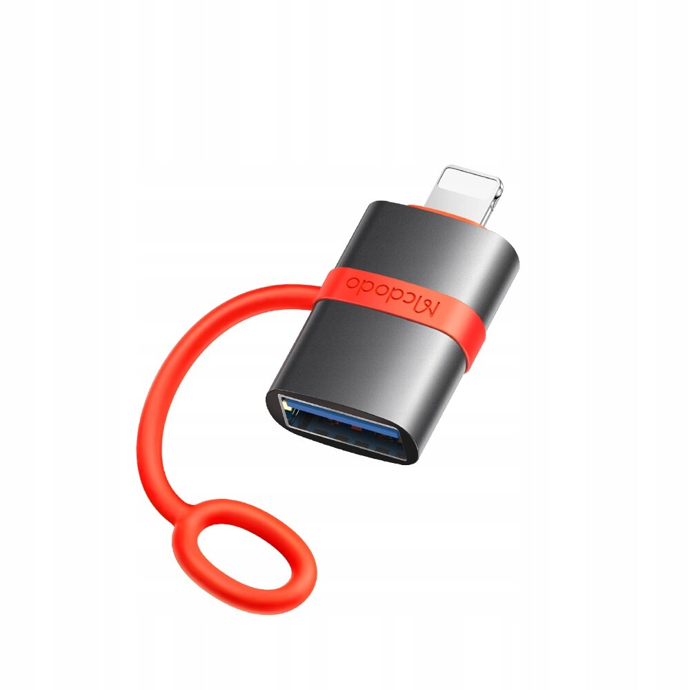 Na obrazie widoczny jest adapter z czarną obudową i czerwonym kablem, z napisem \'Mcdodo\'. Adapter posiada złącze USB-A oraz Lightning.