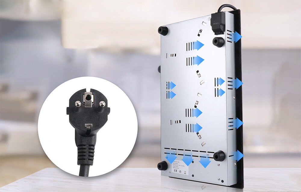 Płyta ceramiczna ISEASY T2V-01M Widok od spodu pokazuje system wentylacyjny płyty grzewczej z zaznaczonym przepływem powietrza. Z boku zaprezentowano także wtyczkę zasilającą cicha praca system chłodzenia wentylacja