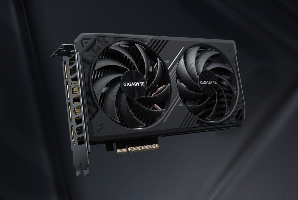 Karta graficzna GIGABYTE GeForce RTX 5060 Ti Windforce OC 16GB Karta graficzna z dwoma dużymi wentylatorami umieszczona na ciemnym tle, widoczny panel z portami wideo po lewej stronie, opis