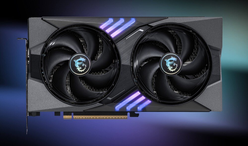 Karta graficzna MSI GeForce RTX 5060 Ti Gaming OC 16GB DLSS 4 Widok karty graficznej z góry, pokazujący dwa duże wentylatory oraz dekoracyjne podświetlenie LED w kolorach niebieskim i fioletowym, wygląd, styl, podświetlenie