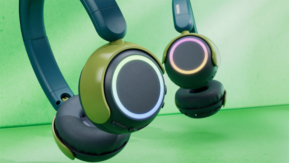 Słuchawki PHILIPS TAK4200CT kolorowe diody LED w nausznikach, dwie pary słuchawek na zielonym tle