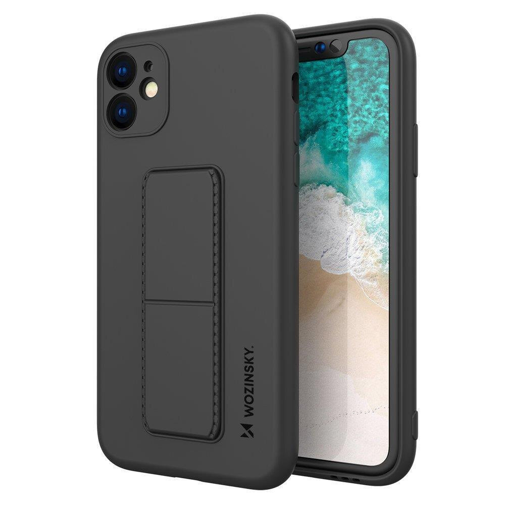 Czarne silikonowe etui z podstawką na telefon, z widocznym logo \'Wozinsky\'. Etui jest założone na telefon, którego ekran wyświetla obraz plaży i oceanu.