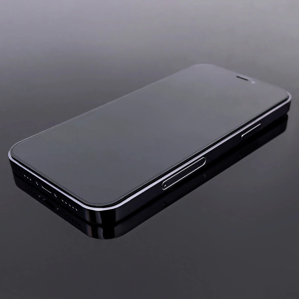 Na obrazie widoczny jest smartfon leżący na płaskiej powierzchni, z wyświetlaczem skierowanym do góry. Telefon ma ciemną obudowę i widoczne przyciski boczne.