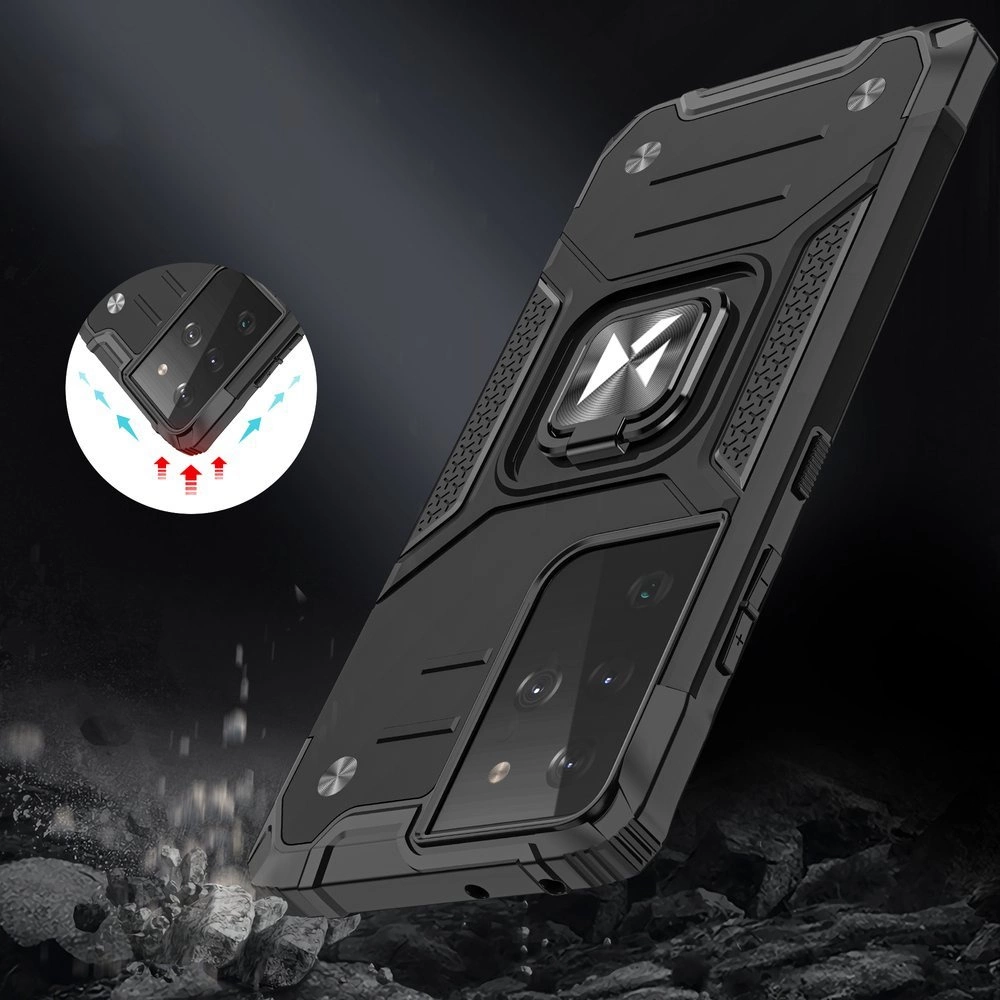 Czarne, pancerne etui na telefon z magnetycznym uchwytem i teksturowanymi bokami. W tle widoczne są skały, a w okrągłym wstawce pokazano telefon w etui z zaznaczonymi strzałkami wskazującymi kierunek ruchu.
