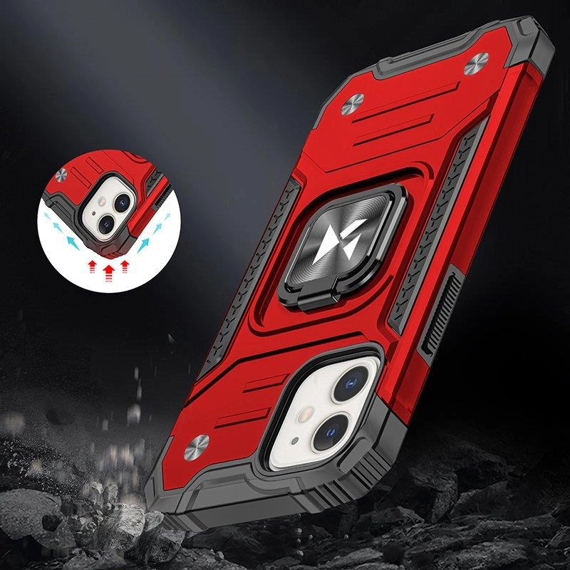 Czerwone etui ochronne na telefon z wbudowanym uchwytem magnetycznym i wzmacnianymi narożnikami. W tle widoczny jest ciemny, skalisty krajobraz.