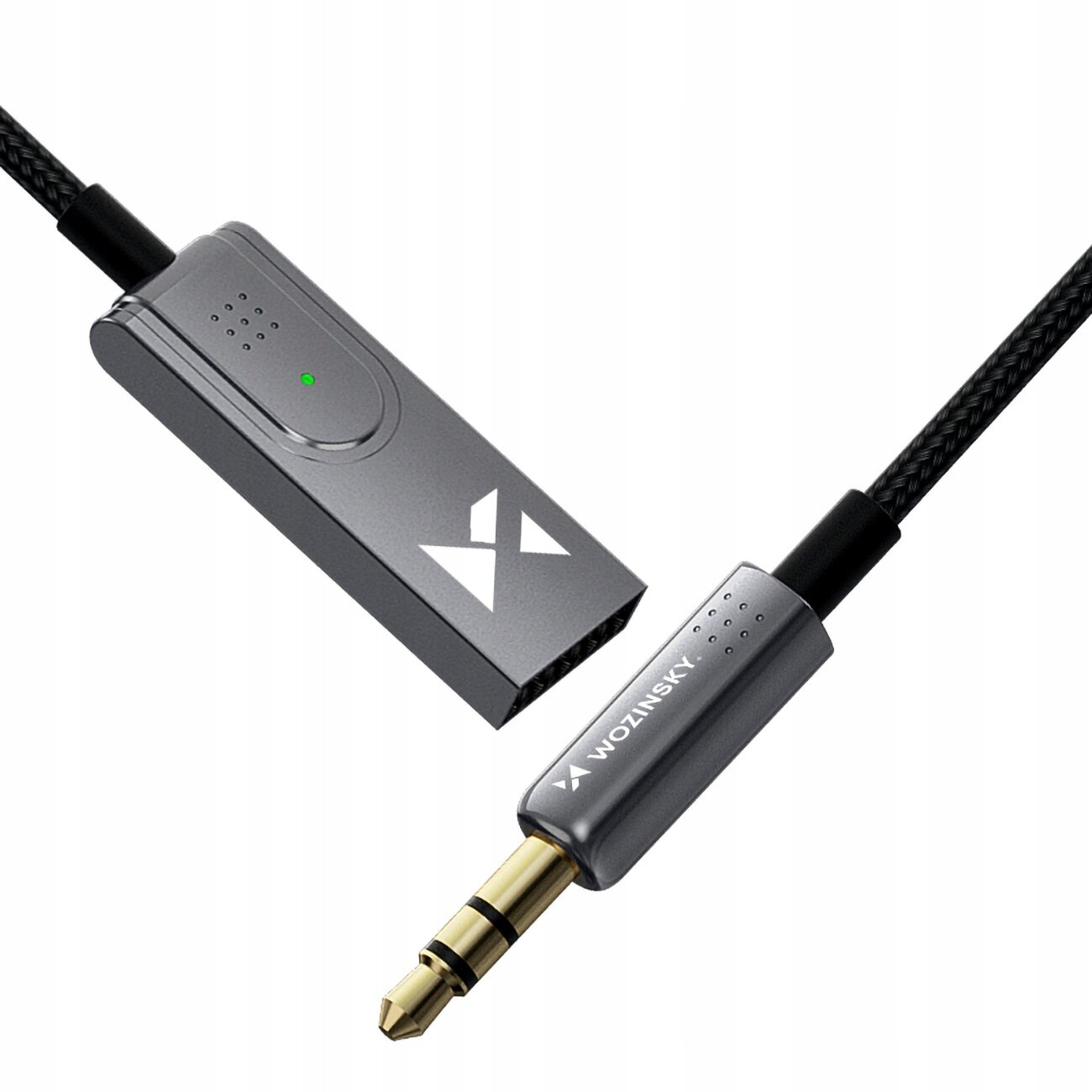 Na obrazie widoczny jest transmiter Bluetooth z metalicznym wykończeniem, posiadający złącze jack oraz logo \'WOZINSKY\'.