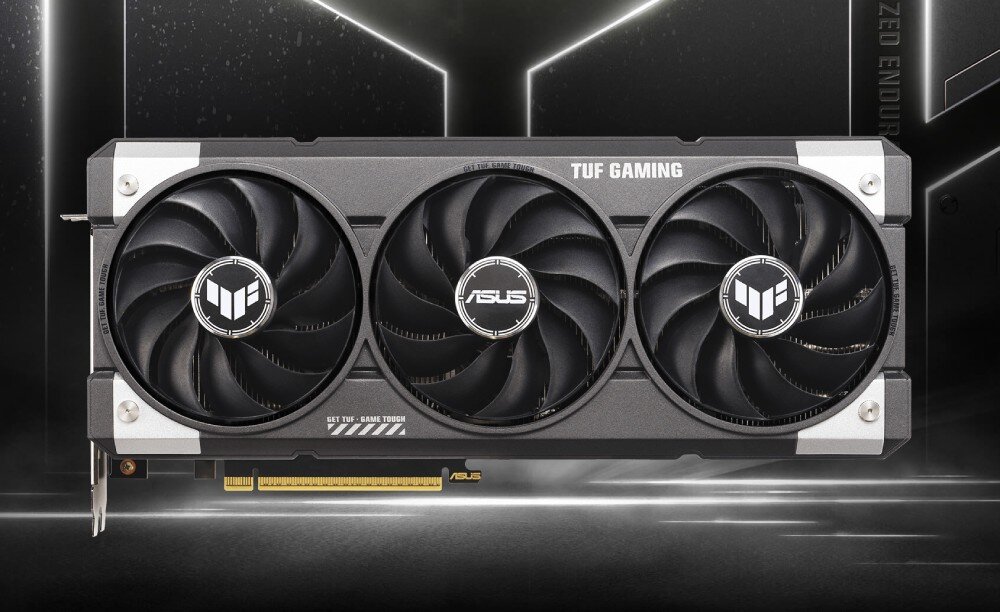 Karta graficzna ASUS TUF Gaming GeForce RTX 5060 Ti OC Edition 16GB Karta graficzna z trzema wentylatorami na rozmytym, futurystycznym tle z białymi, świecącymi liniami