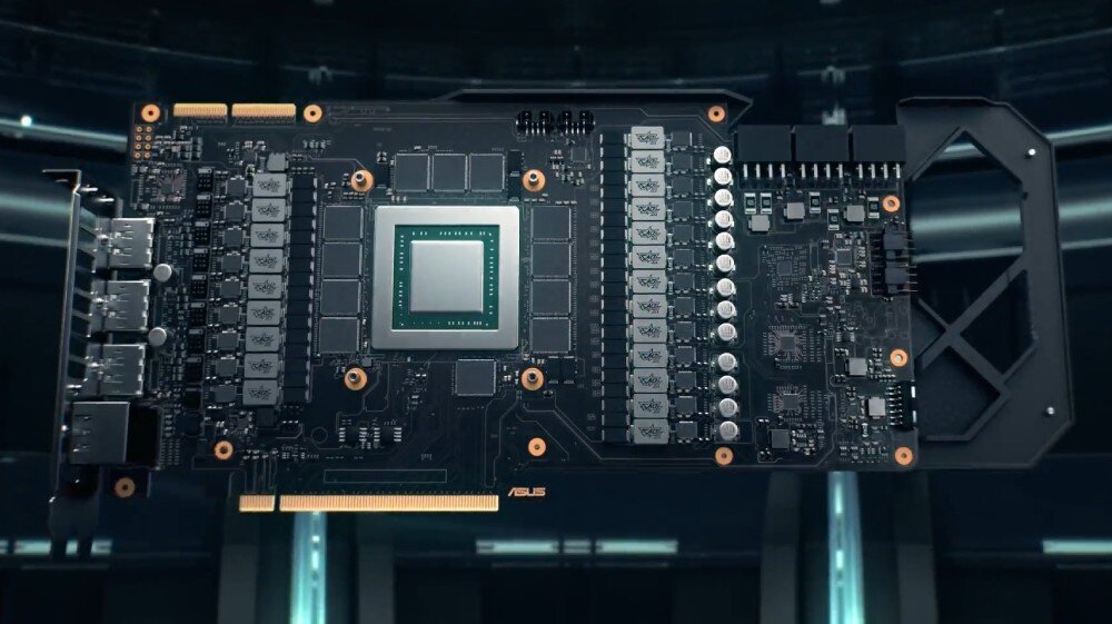 Karta graficzna ASUS TUF Gaming GeForce RTX 5060 Ti OC Edition 16GB Płytka drukowana karty graficznej z widocznym procesorem i modułami pamięci na rozmytym, futurystycznym tle