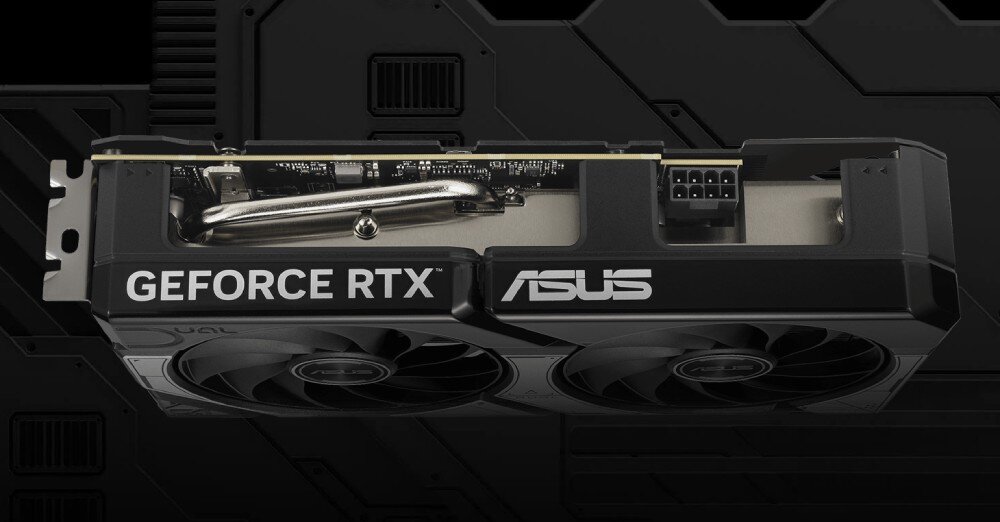 Karta graficzna ASUS GeForce RTX 5060 Ti Dual OC 16GB Widok na górną krawędź karty graficznej z widocznym złączem zasilania oraz miedzianą rurką cieplną