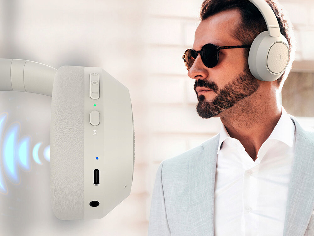 POWERLOCUS Universe słuchawki Bluetooth 5.3 ANC pasywna redukcja hałasu 60h, osoba z założonymi słuchawkami nausznymi
