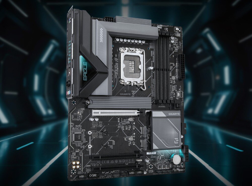 Komputer MAD DOG Powered by Gigabyte AORUS301-I14WR32WP Płyta główna w formacie ATX z gniazdem procesora LGA, czterema slotami pamięci RAM, osłoną na sekcję zasilania i napisem 'Eagle' na tle ciemnego tunelu z neonowym światłem, płyta główna, kompatybilność, radiatory, łączność Wi-Fi